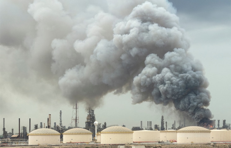 Smoke rises following a strike on Bahrain’s Bapco Oil Refinery.—Reuters