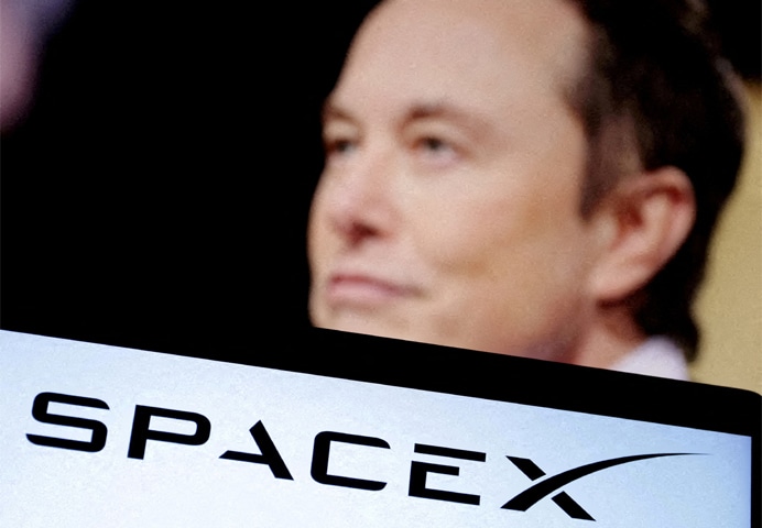 SPACEX&rsquo;s logo and an Elon Musk photo are seen in this illustration created on Dec 19, 2022.&mdash;Reuters/file