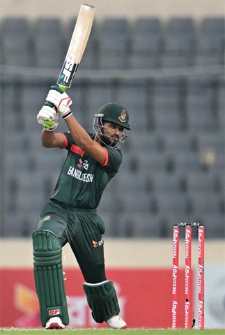 BANGLADESH batter Najmul Hossain plays a shot during the first One-day International against
Pakistan at the Sher-e-Bangla National Stadium on Wednesday.—AFP
