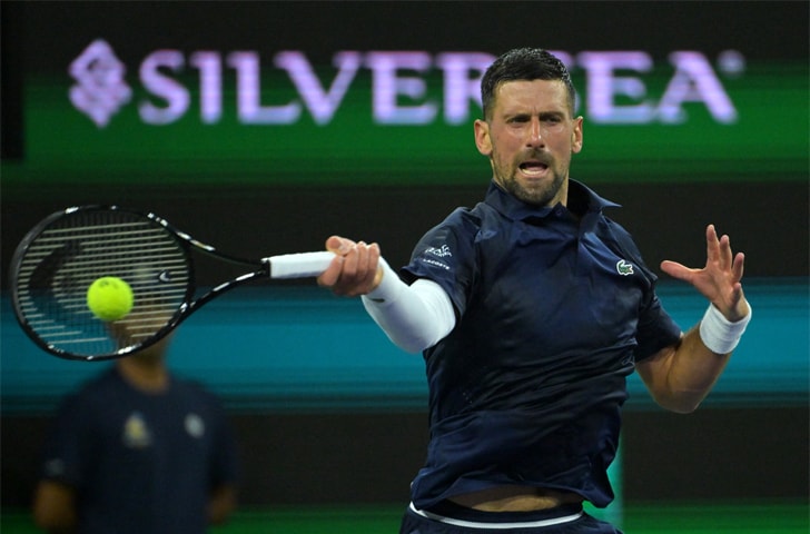 SERBIA&rsquo;S Novak Djokovic hits a return against Jack Draper of Britain during their Indian Wells fourth-round match at the Indian Wells Tennis Garden.&mdash;Reuters