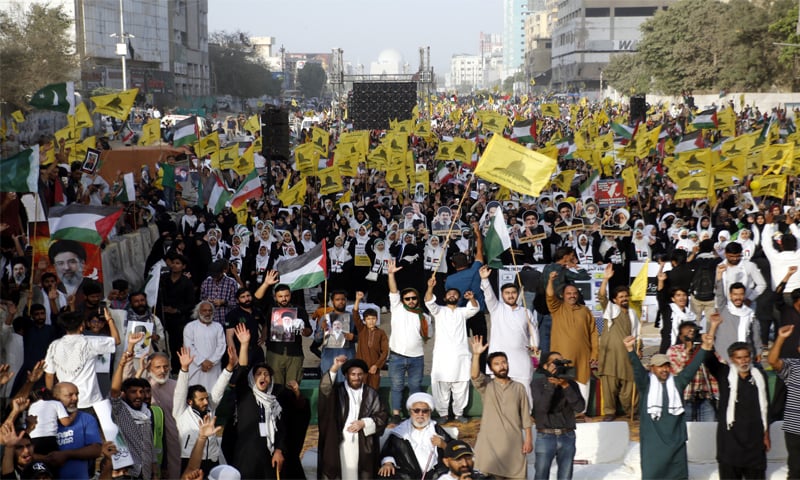 Participants in the main Al Quds Day rally on M.A. Jinnah Road chant slogans. &mdash;Shakil Adil / White Star