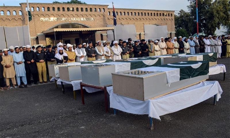 FUNERAL prayers underway for the police officers martyred in an IED attack in Lakki Marwat.&mdash;AFP