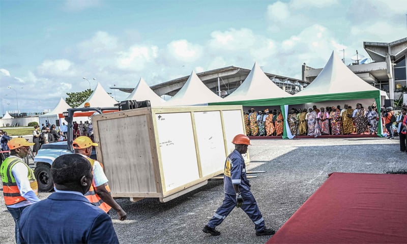 THE crate containing the &lsquo;talking drum&rsquo; is being lifted upon its arrival in Abidjan, the capital of Ivory Coast.&mdash;AFP