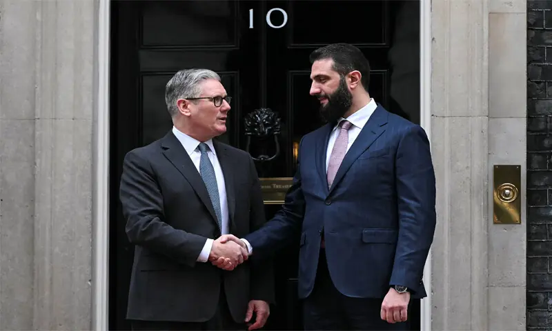 Syria&rsquo;s President Ahmed al Sharaa is welcomed by Britain&rsquo;s Prime Minister Keir Starmer at
10 Downing Street.&mdash;Reuters