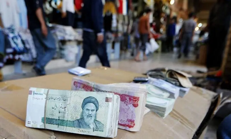 In the midst of war, the thriving cross-border trade has bolstered demand for Iranian currency.&mdash; AFP/file