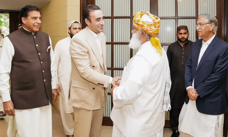 PPP chairman, along with other party leaders, meets the JUI-F chief at his residence.—White Star PPP chairman, along with other party leaders, meets the JUI-F chief at his residence.—White Star