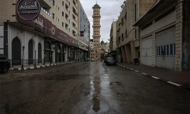 An empty street can be seen in the Israeli-occupied West Bank during a general strike to protest a bill approved by Israel’s parliament that would allow the execution of Palestinians convicted on terror charges.—AFP An empty street can be seen in the Israeli-occupied West Bank during a general strike to protest a bill approved by Israel’s parliament that would allow the execution of Palestinians convicted on terror charges.—AFP