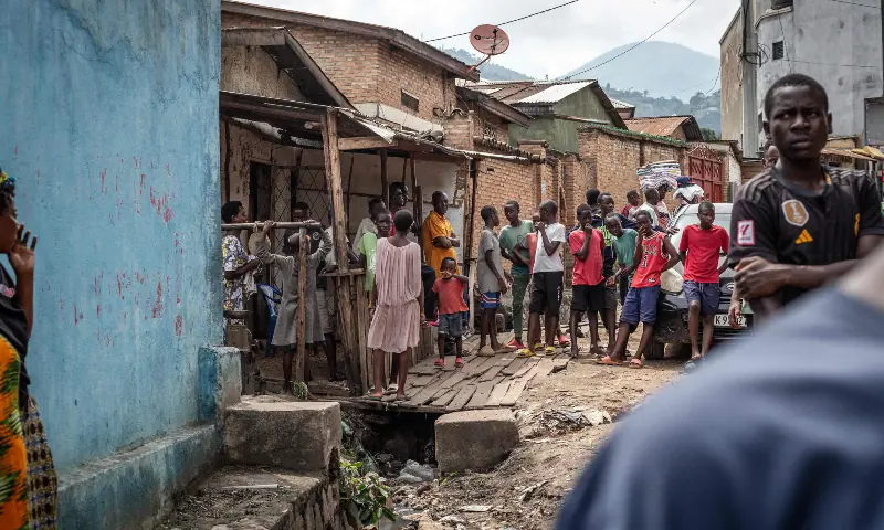 Residents gather to assess damage at the site where a person died following explosions after a fire at a military arsenal in the Musaga district of Bujumbura, on April 1, 2026. — AFP Residents gather to assess damage at the site where a person died following explosions after a fire at a military arsenal in the Musaga district of Bujumbura, on April 1, 2026. — AFP
