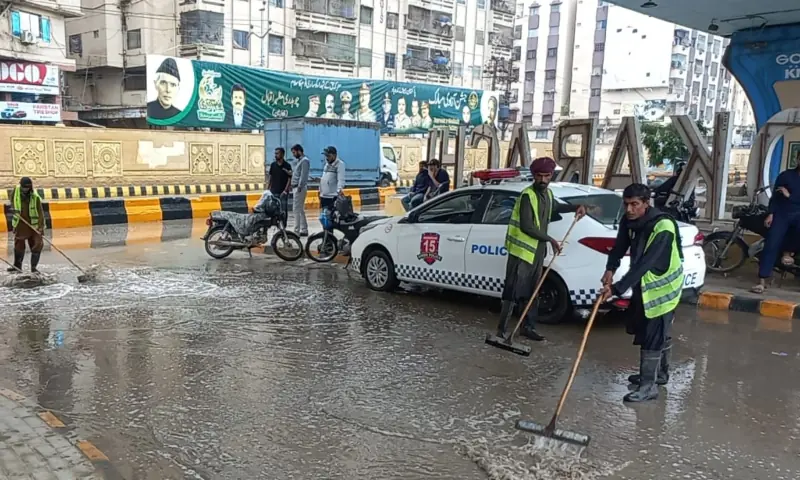 Municipality staff work to clear accumulated rainwater in Karachi’s Shah Faisal Town on April 2, 2026. — via author Municipality staff work to clear accumulated rainwater in Karachi’s Shah Faisal Town on April 2, 2026. — via author
