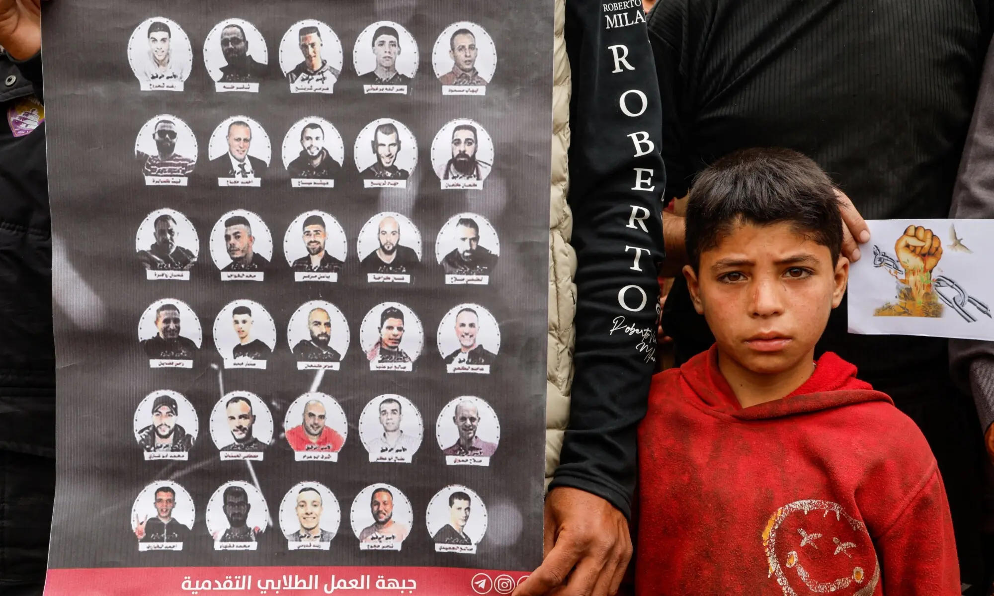 A Palestinian boy looks on during a protest against the execution of the Israeli death penalty law for Palestinians convicted in military courts of deadly attacks, in Khan Younis, southern Gaza Strip, April 2, 2026. &mdash; Reuters