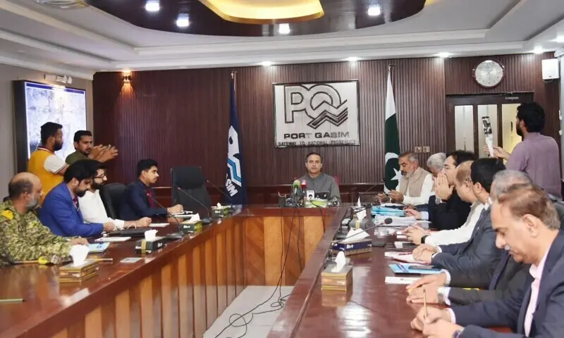 Federal Minister for Maritime Affairs Junaid Anwaar Chaudhry chairs a meeting with the Port Qasim Authority officers at the PQA office in Karachi. &mdash; APP/File
