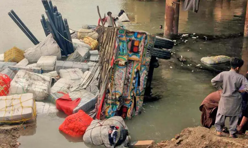 THE truck that plunged into Phulleli Canal after falling off the Hyderbad Bypass.&mdash;Umair Ali