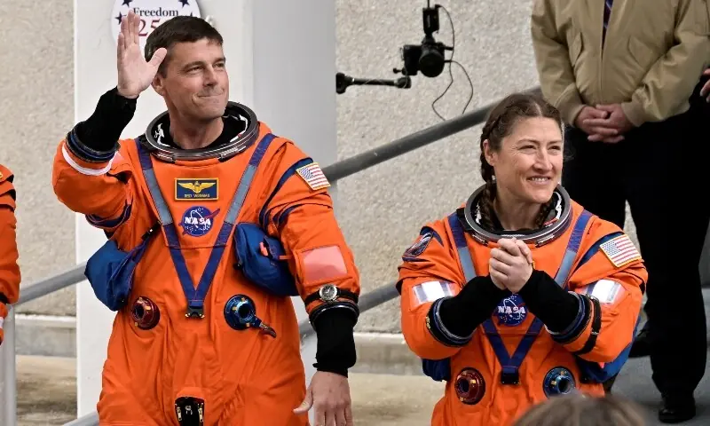 Artemis II NASA astronauts Reid Wiseman and Christina Koch wave to family before boarding the astronaut van for their drive to launch pad 39B at the Kennedy Space Center in Cape Canaveral, Florida, US April 1, 2026. &mdash;Reuters