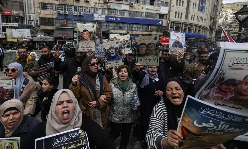 Relatives of Palestinian prisoners hold placards and shout slogans during a rally in the Israeli-occupied West Bank city of Nablus on March 31, 2026, against a bill approved by Israel’s parliament that would allow the execution of Palestinians convicted on terror charges for deadly attacks. — AFP Relatives of Palestinian prisoners hold placards and shout slogans during a rally in the Israeli-occupied West Bank city of Nablus on March 31, 2026, against a bill approved by Israel’s parliament that would allow the execution of Palestinians convicted on terror charges for deadly attacks. — AFP