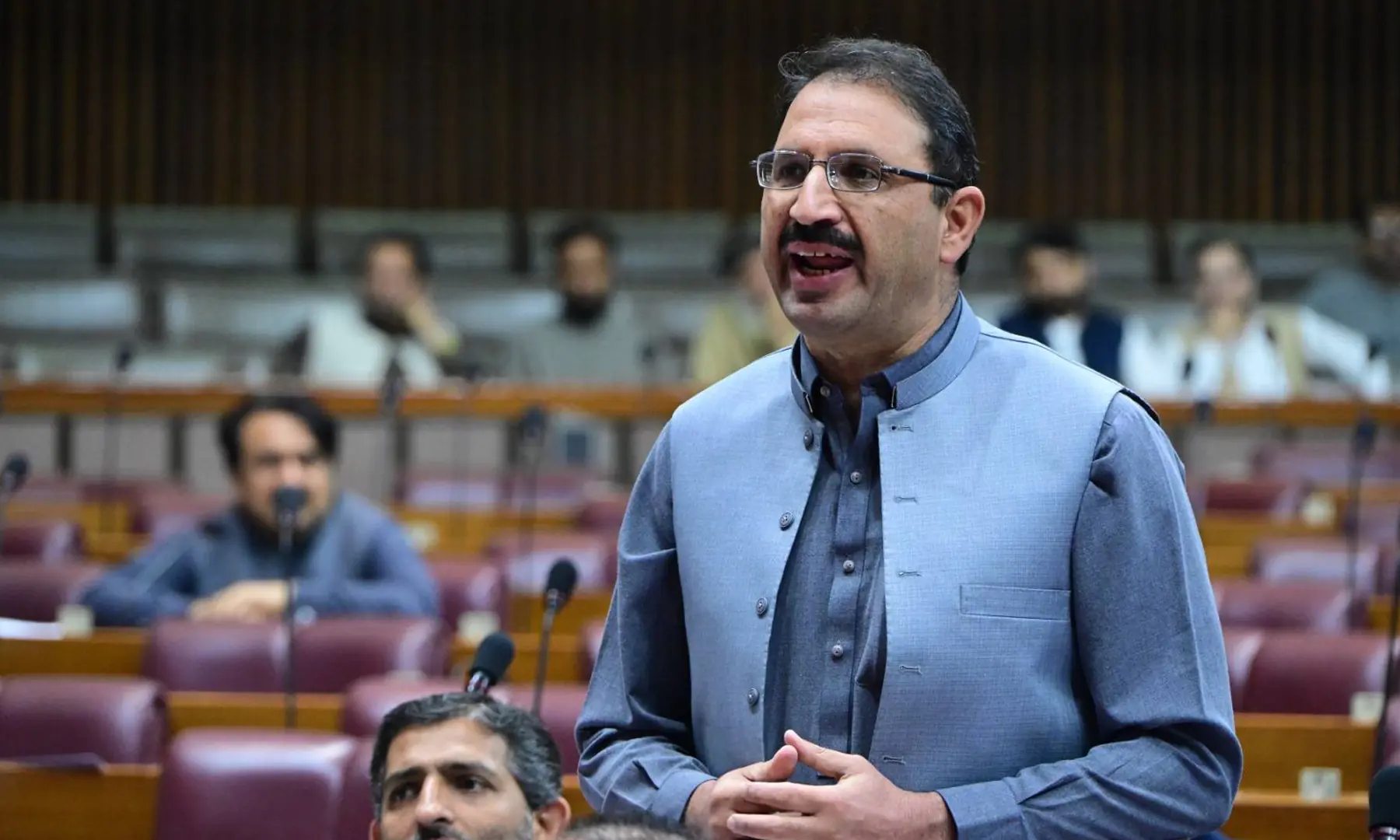 PTI MNA Junaid Akbar speaks during a National Assembly session on April 3. &mdash; Photo courtesy NA/ Facebook