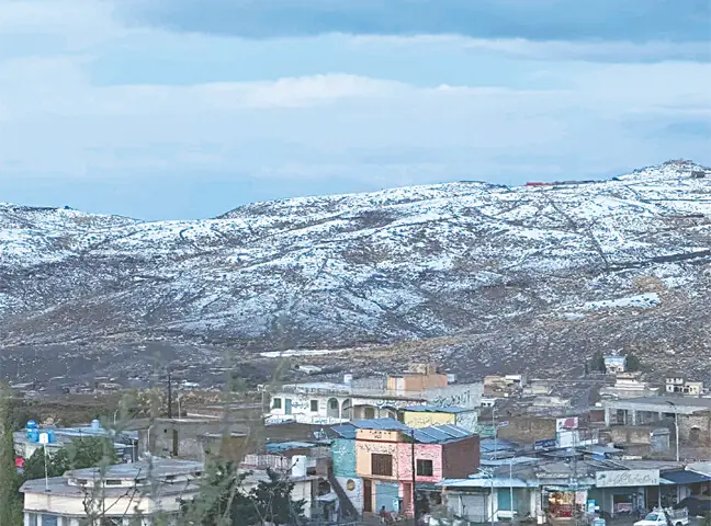 DERA GHAZI KHAN: South Punjab hill station Fort Munro after hailstorm on Friday afternoon. &mdash; Photo by Tariq Saeed Birmani