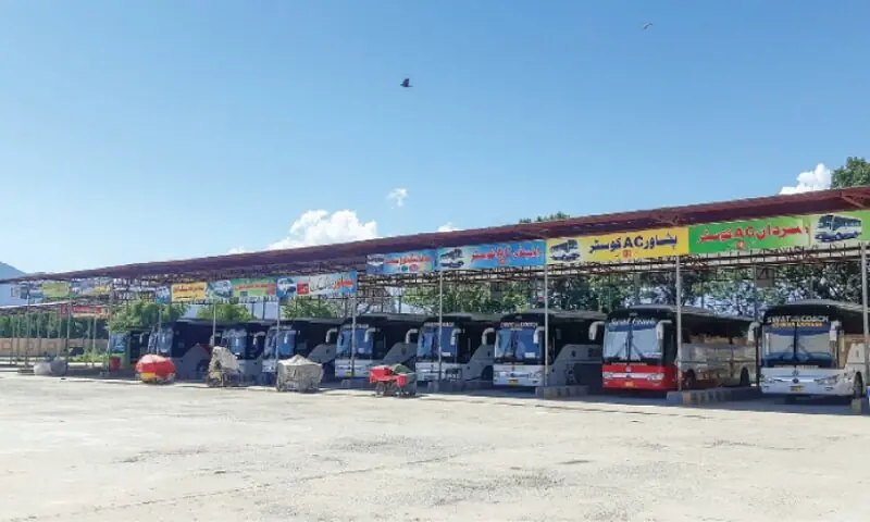 A view of the general bus stand in Mingora. &mdash; Dawn/File