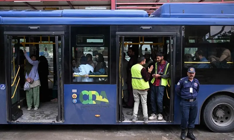 Passengers gather aboard a government bus at a bus stop in Islamabad on April 3, 2026. —AFP Passengers gather aboard a government bus at a bus stop in Islamabad on April 3, 2026. —AFP