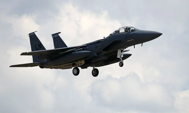 A US Air Force (USAF) F-15E Eagle fighter jet, is pictured as it prepares to land at RAF (Royal Air Force) Lakenheath, east of England, on June 15, 2020. &mdash;AFP/File