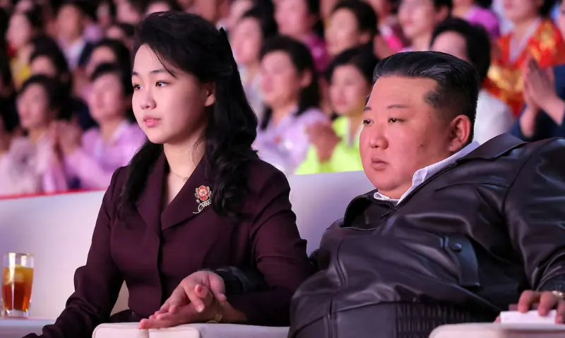 North Korean leader Kim Jong Un and his daughter Kim Ju Ae attend a performance commemorating International Women’s Day in Pyongyang, North Korea. — KNCA via Reuters/File
