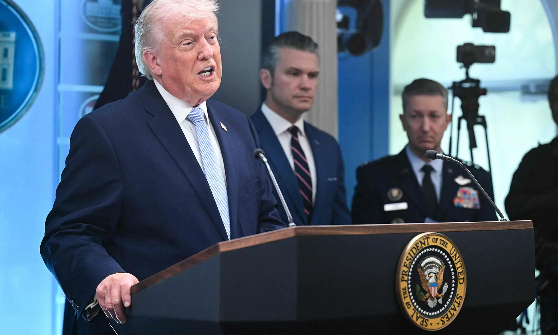 US President Donald Trump, flanked by Secretary of War Pete Hegseth and Chairman of the Joint Chiefs of Staff General Dan Caine, speaks about the war in Iran in the James S Brady Press Briefing Room of the White House, in Washington, DC, the US on on April 6. — AFP