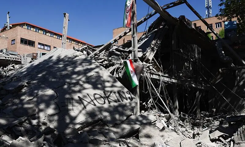 An Iranian flag hangs amidst the rubble of a building of the Sharif University of Technology on April 7, which was damaged in a strike, in Tehran, Iran. — Reuters An Iranian flag hangs amidst the rubble of a building of the Sharif University of Technology on April 7, which was damaged in a strike, in Tehran, Iran. — Reuters