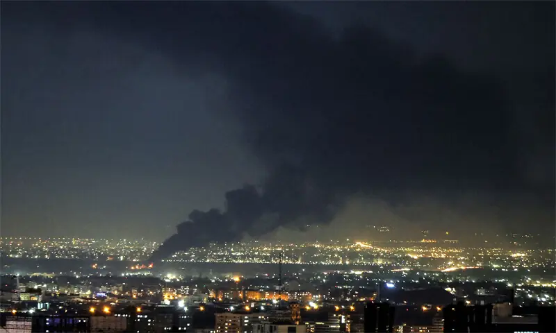 Smoke rises from the site of a US-Israeli strike on Tehran on Tuesday.&mdash;AFP