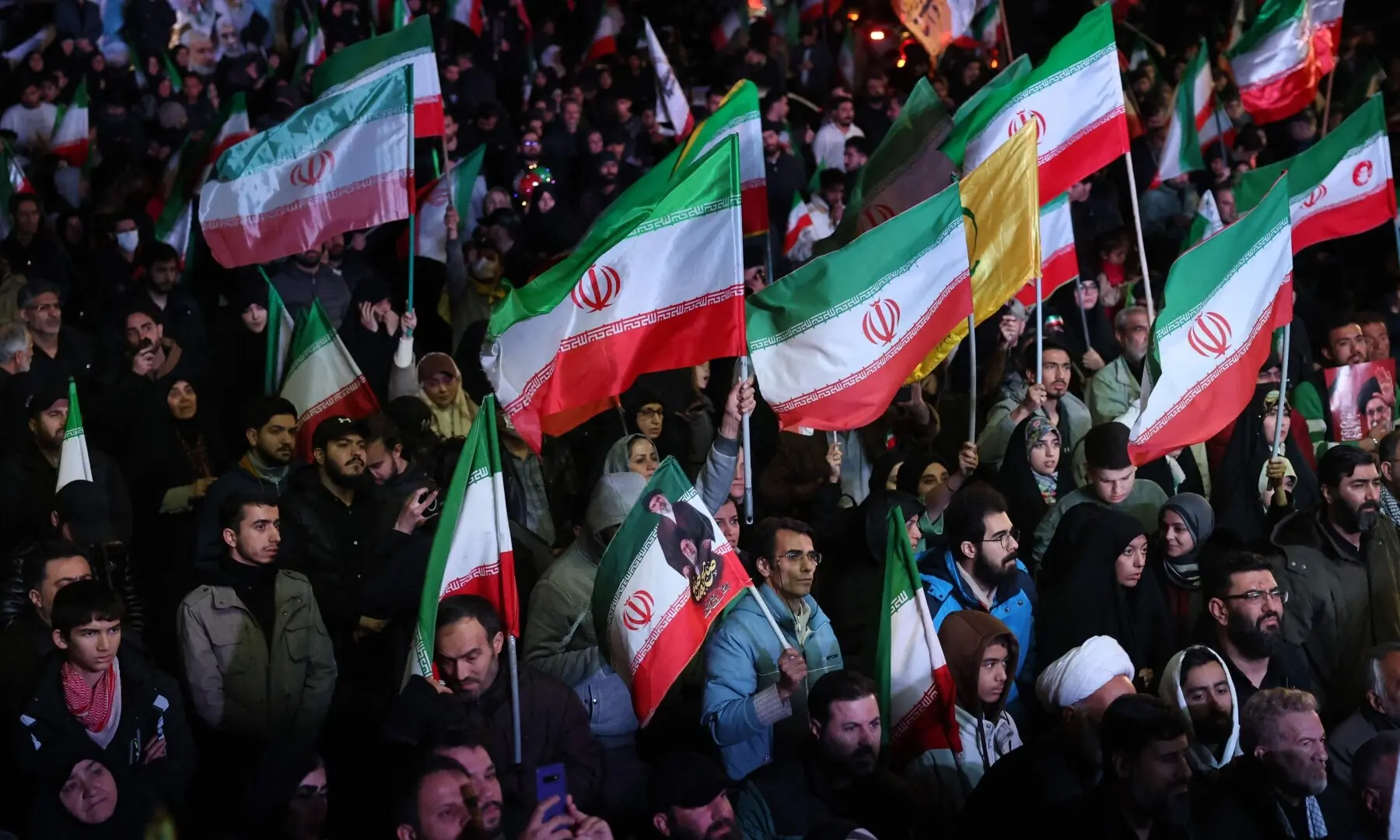 Iranians react after a ceasefire announcement at the Enqelab square, in Tehran, on April 8 2026. &mdash;AFP