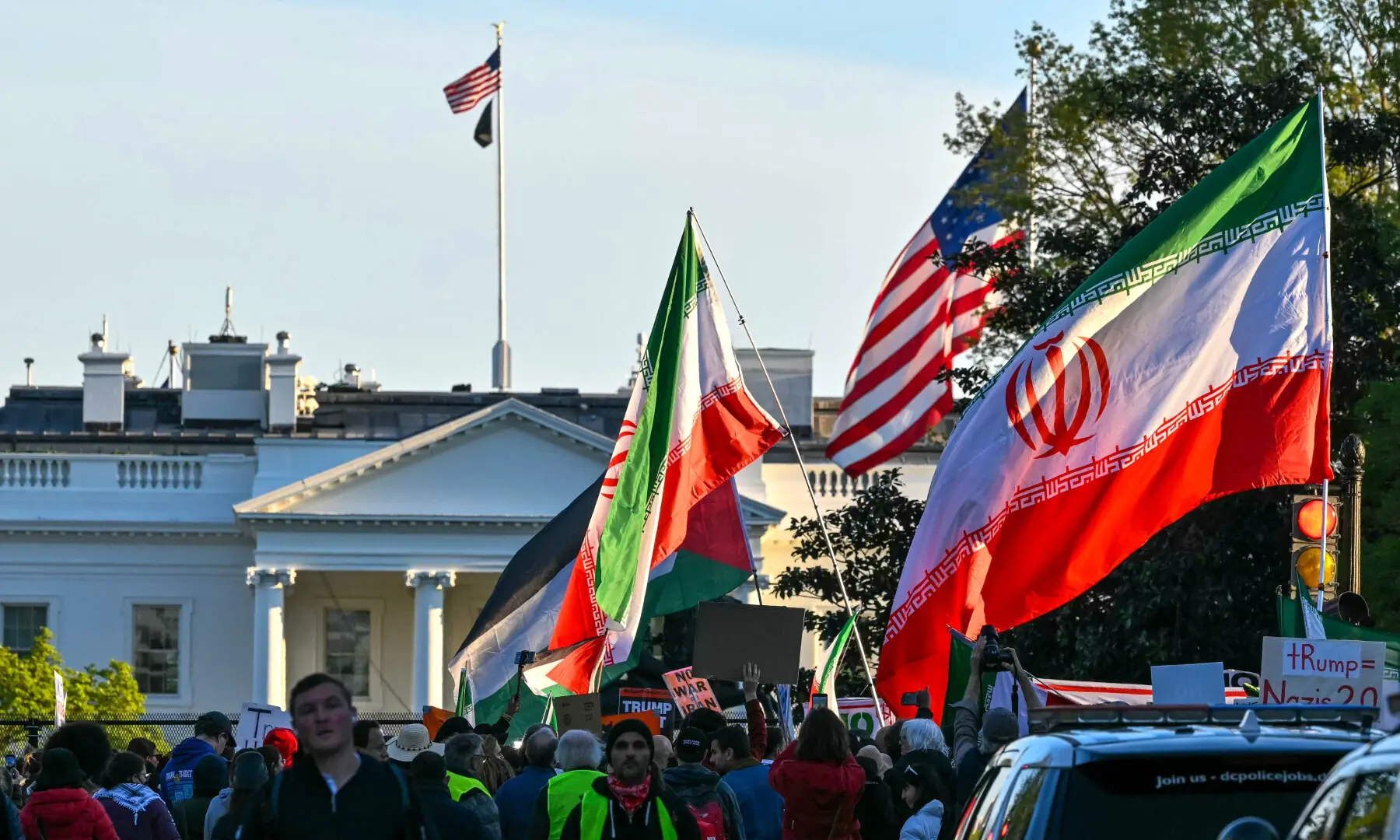 Demonstrators wave Iranian flags during a protest against US military action in Iran near the White House in Washington, DC, on April 7, 2026. — AFP Demonstrators wave Iranian flags during a protest against US military action in Iran near the White House in Washington, DC, on April 7, 2026. — AFP