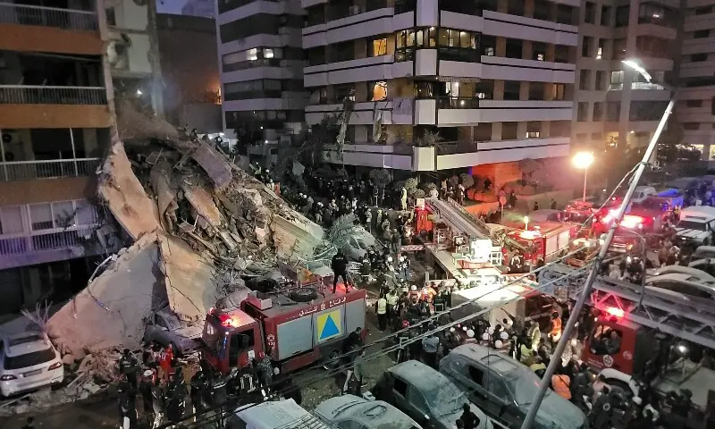 First responders and residents gather at the site of an Israeli airstrike in Beirut’s Tallet al-Khayyat neighbourhood, on April 8, 2026. — AFP First responders and residents gather at the site of an Israeli airstrike in Beirut’s Tallet al-Khayyat neighbourhood, on April 8, 2026. — AFP