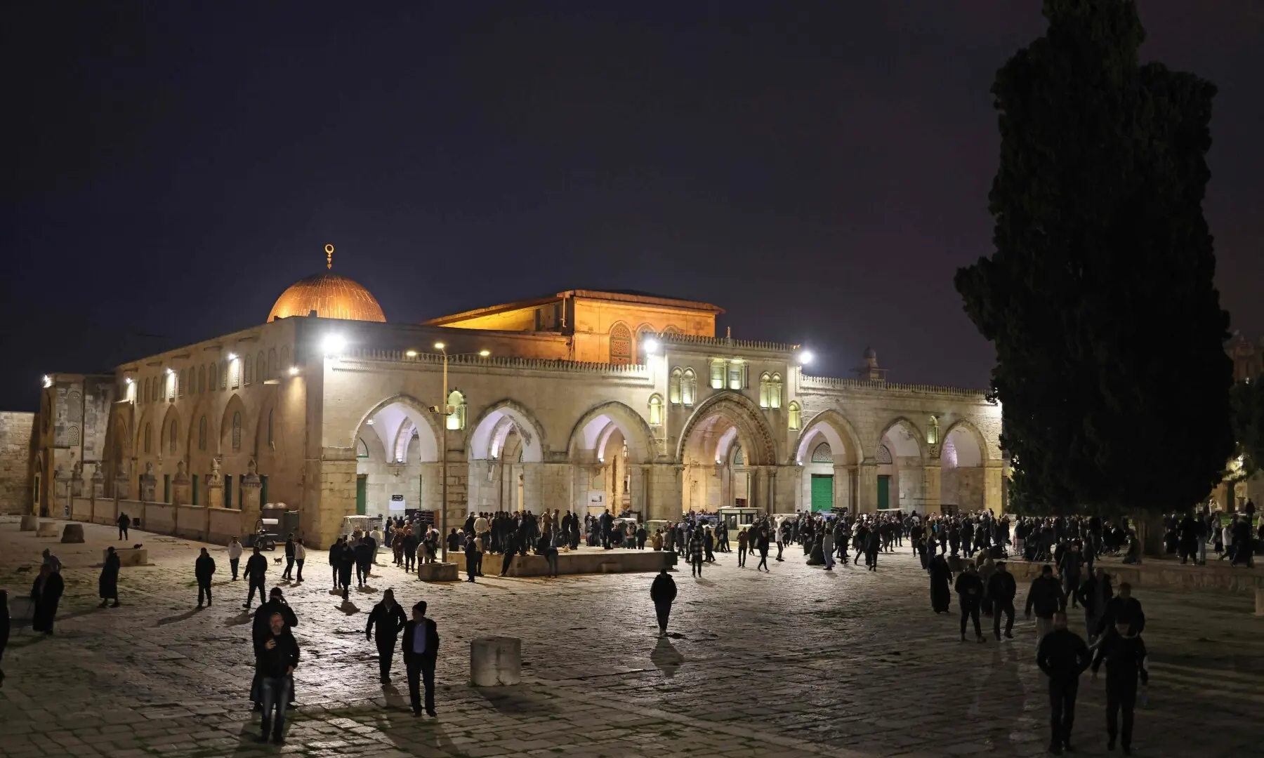 Worshippers gather near the Dome of the Rock at the Al-Aqsa Mosque compound for the dawn prayers in Jerusalem on April 9, 2026. &mdash;AFP
