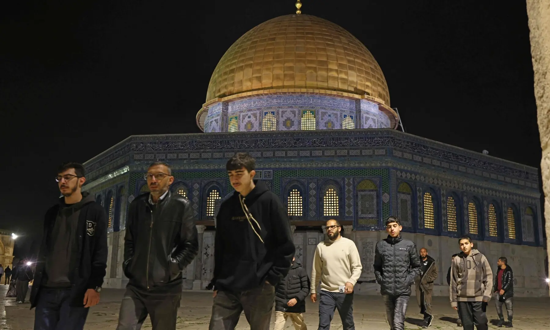 Worshippers gather near the Dome of the Rock at the Al-Aqsa Mosque compound for the dawn prayers in Jerusalem on April 9, 2026. &mdash;AFP