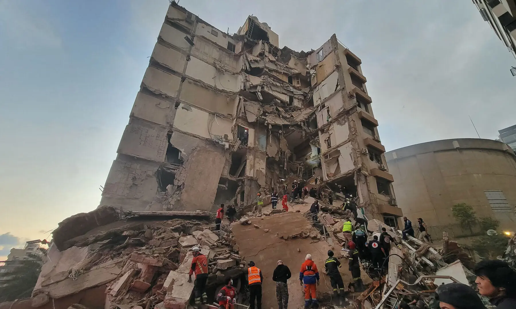First responders and residents gather at the site of an Israeli airstrike in Beirut&rsquo;s Tallet al-Khayyat neighbourhood, on April 8, 2026. &mdash; AFP