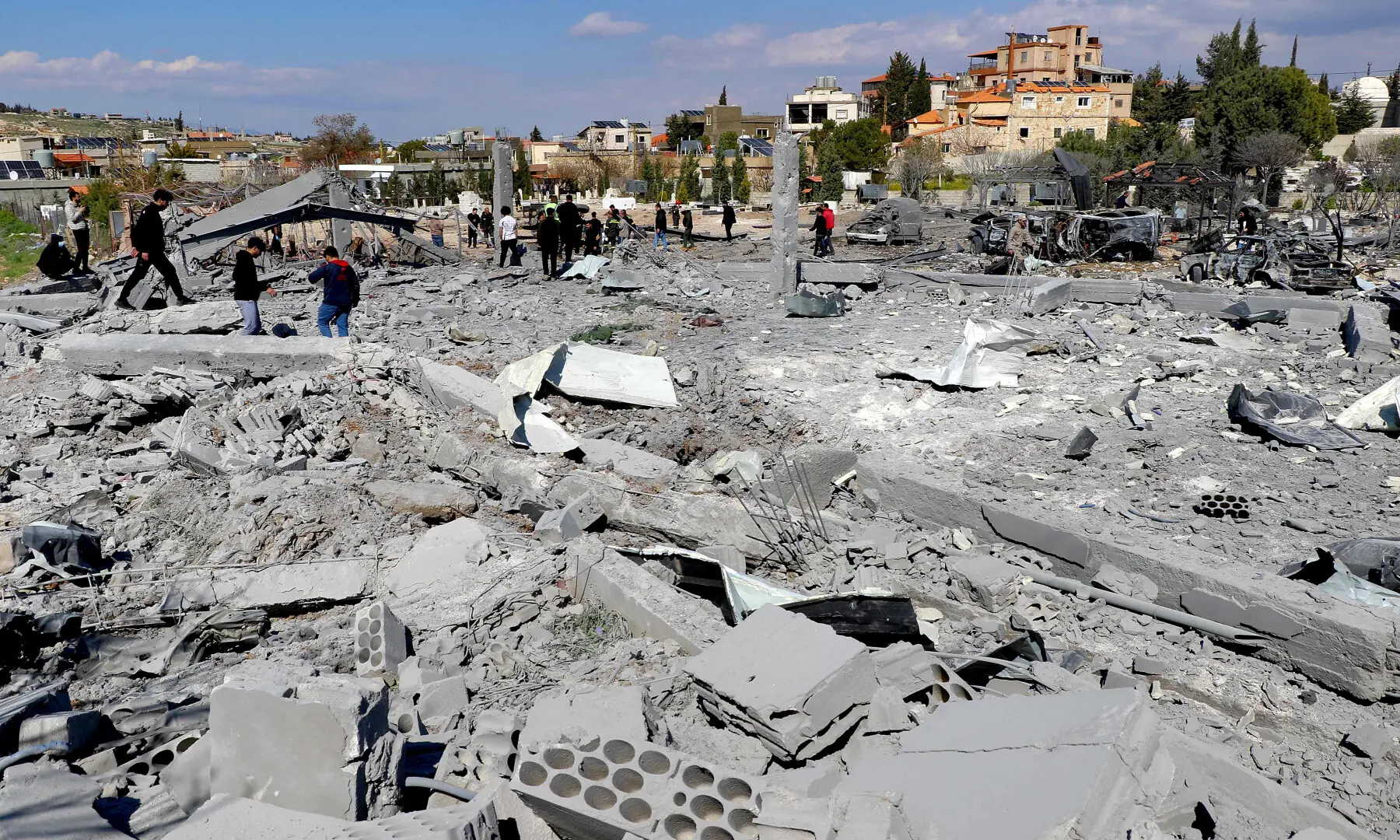 First-responders inspect destroyed vehicles and rubble and debris in the aftermath of Israeli bombardment on the village of Shmistar in the centre of Lebanon&rsquo;s eastern Bekaa valley on April 8, 2026. &mdash;  AFP