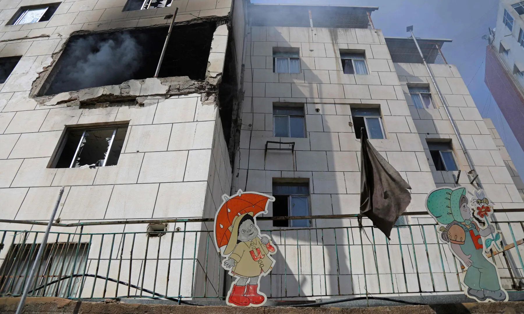 Smoke billows from a building that was targeted in an Israeli strike in Basta neighbourhood of Beirut on April 8, 2026. &mdash; AFP
