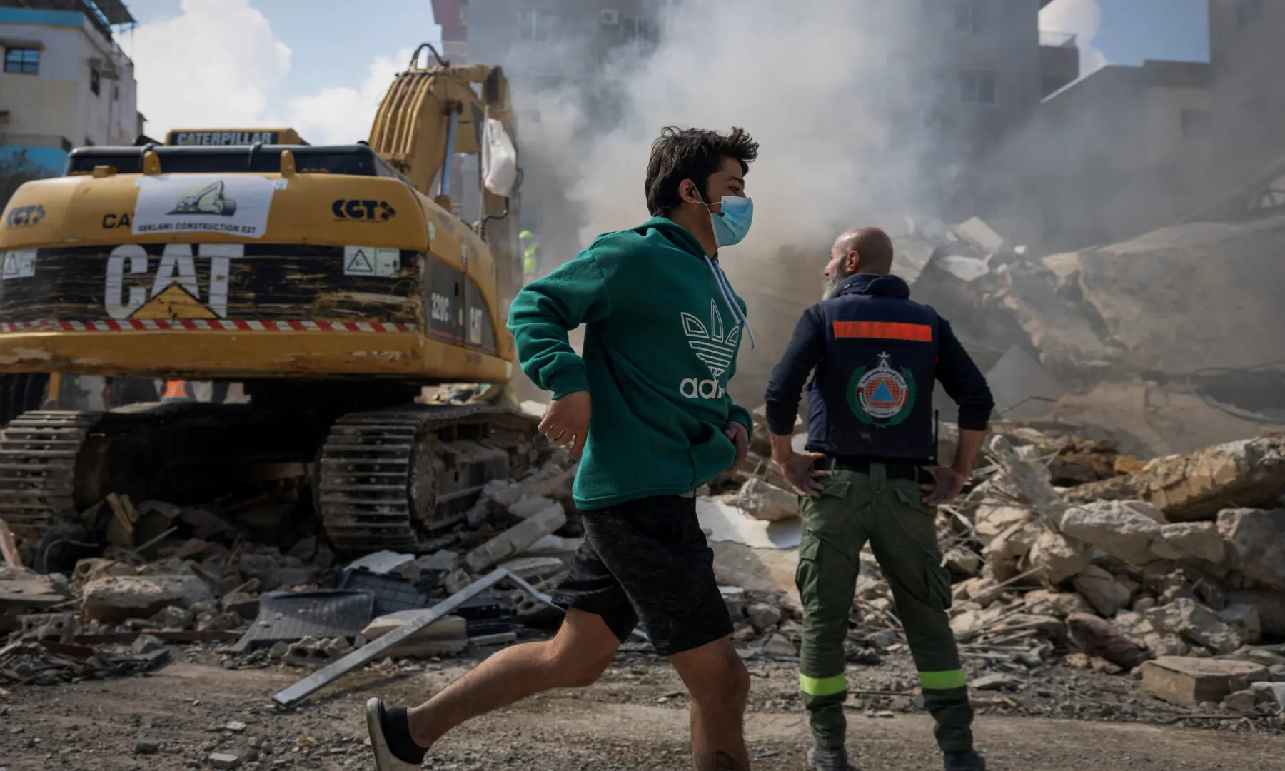 A boy runs past the site of an Israeli strike in Tyre, Lebanon on April 8, 2026. &mdash; Reuters