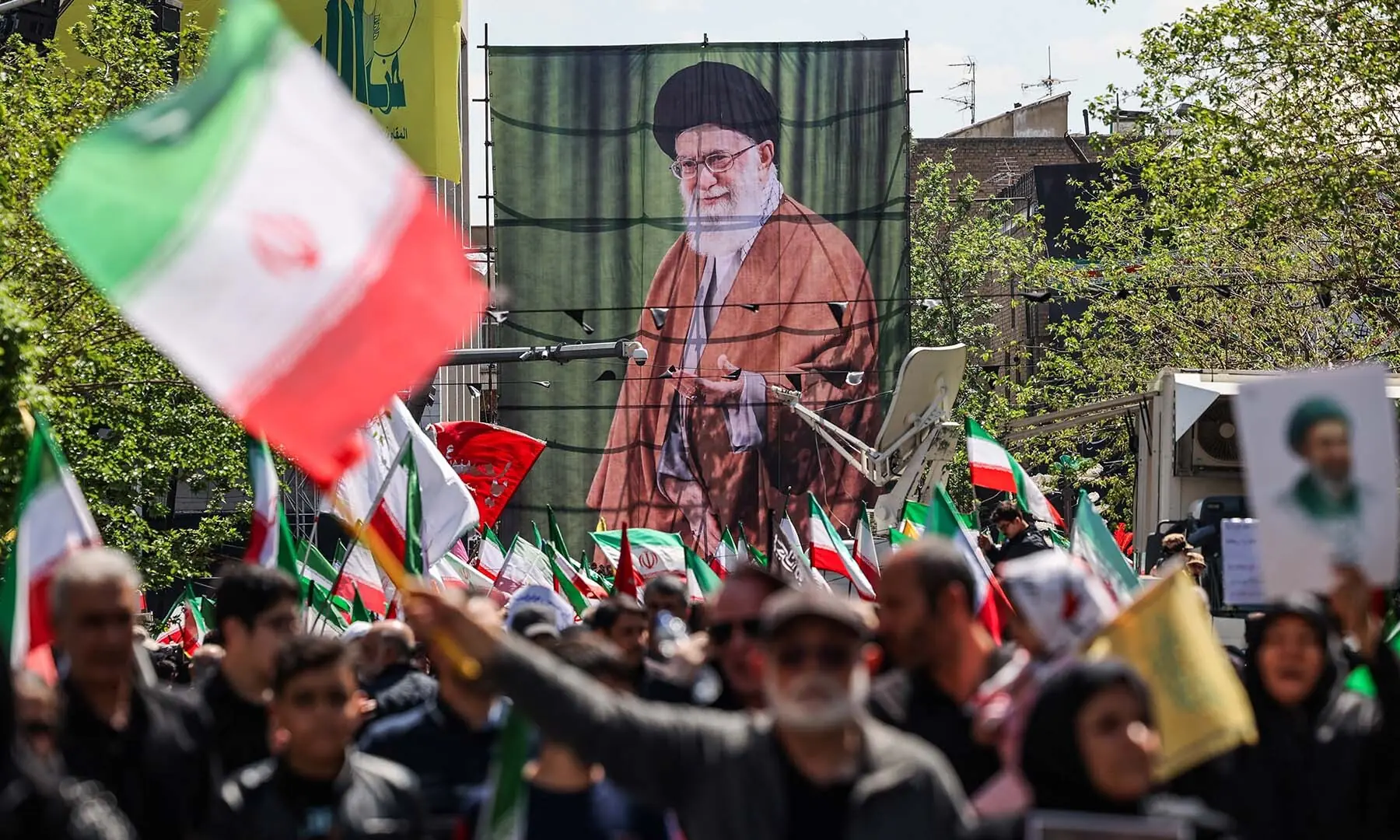 A banner with an image of Supreme Leader of Iran, Ayatollah Ali Khamenei, during a ceremony marking 40 days since he was assassinated in Israeli and US strikes in Tehran, Iran on April 9. &mdash; Reuters