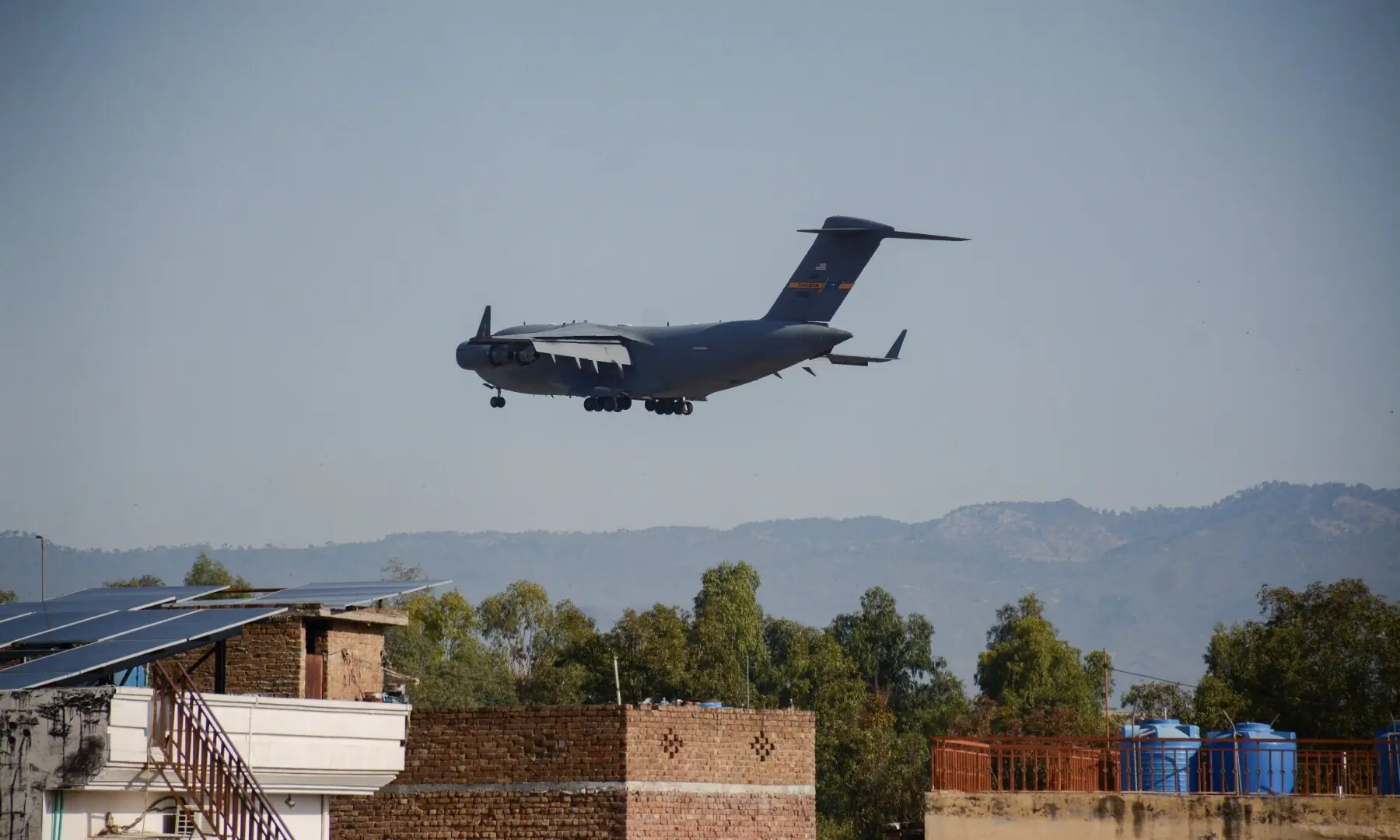 A US Air Force transport aircraft with &ldquo;Charleston&rdquo; written on its tail approaches PAF Base Nur Khan as Pakistan prepares to host the US and Iran for peace talks, in Rawalpindi, Pakistan, April 10, 2026. &mdash;AFP