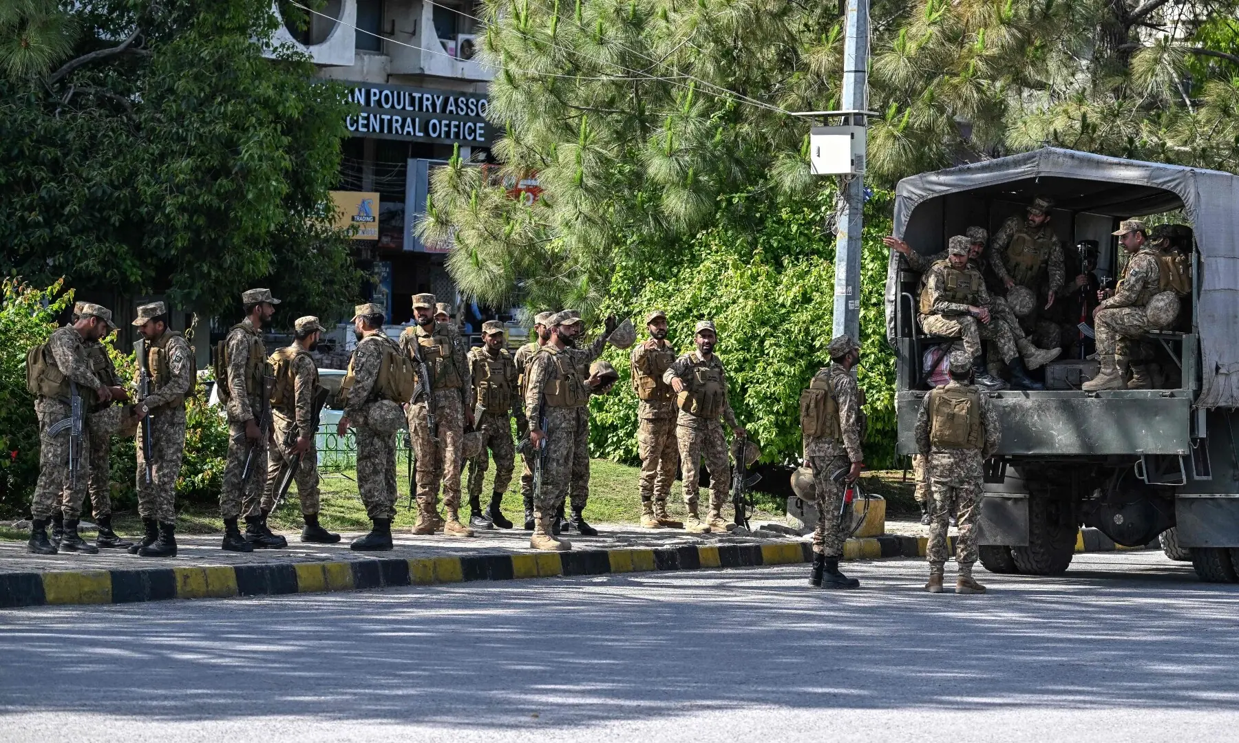 Pakistani army soldiers arrive for deployment at the Red Zone area of Islamabad on April 10, 2026. &mdash;AFP
