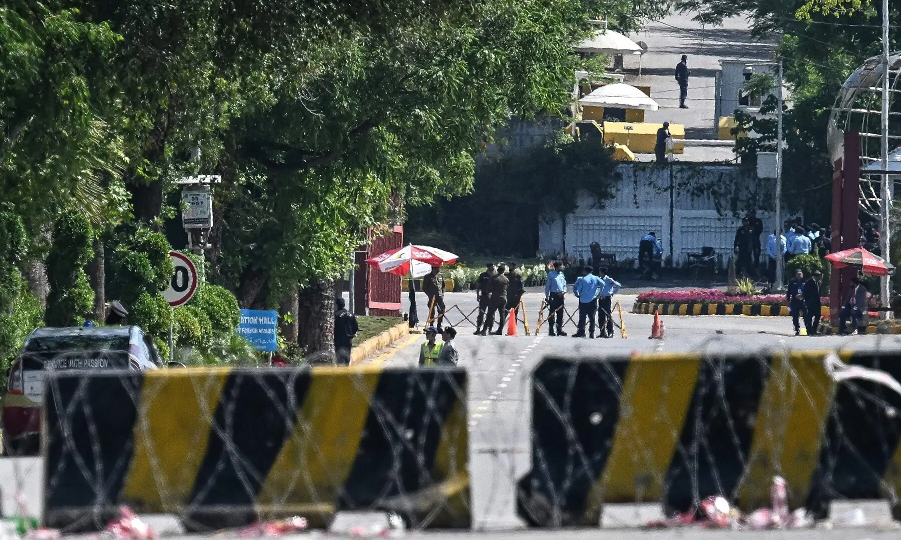 Security personnel stand guard along the cordon street near the expected venue of the US-Iran talks in the Red Zone area of Islamabad on April 10, 2026. &mdash;AFP