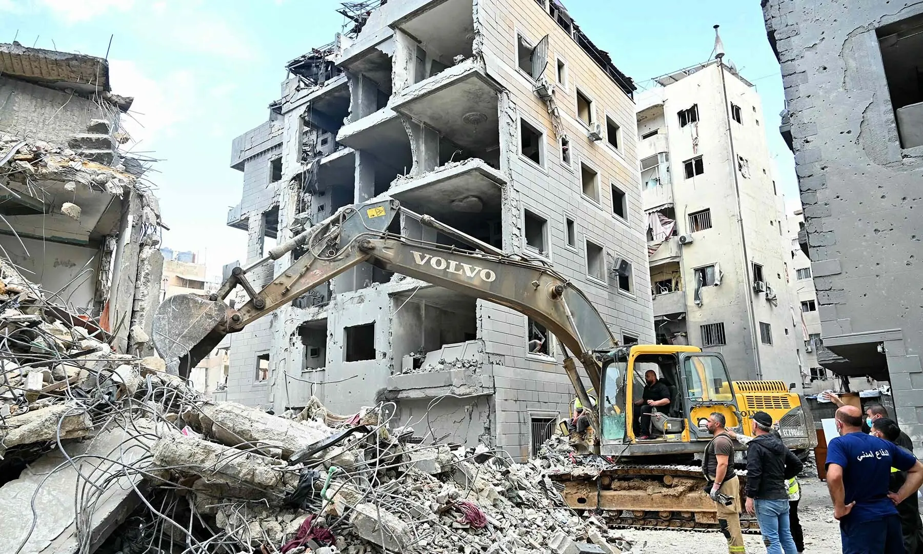 This photograph taken on April 10 shows a digger clearing the rubble of a building in Beirut’s Hay al-Selloum neighbourhood, which was targeted in an Israeli strike earlier this week. — AFP