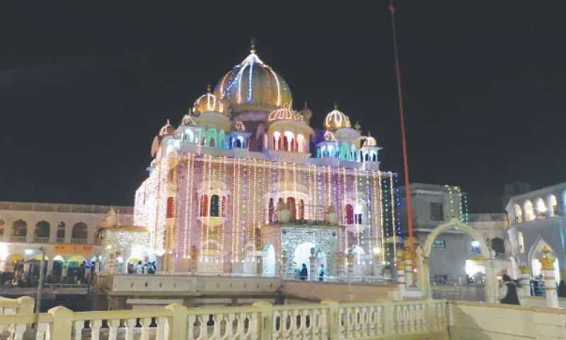 The Gurdwara Panja Sahib Hassanabdal illuminated on Friday ahead of Baisakhi festival. &mdash; Dawn