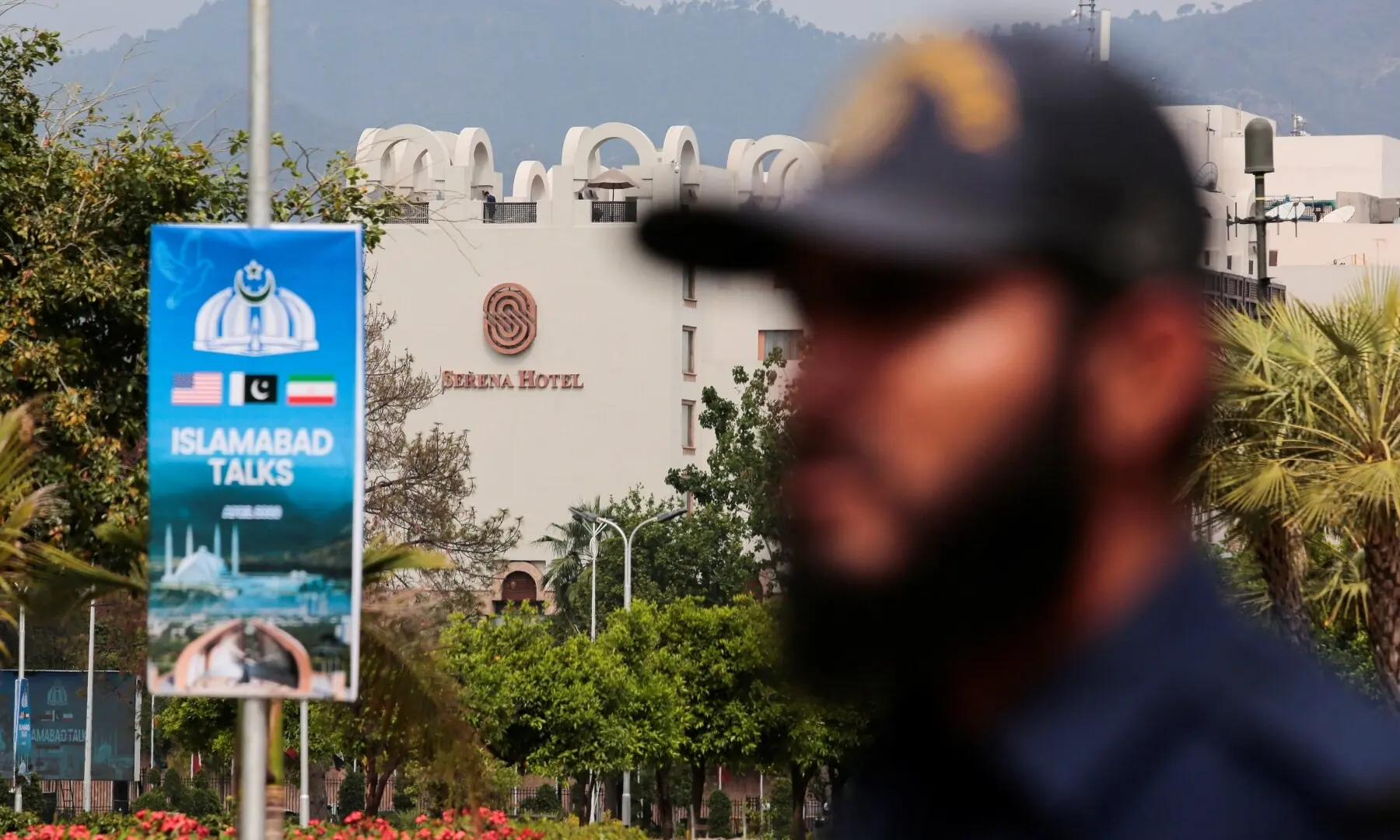 A security personnel stands guard outside the media centre near the road leading to Serena Hotel, as delegations from the United States and Iran are expected to hold high-stakes talks in Islamabad, Pakistan, April 11, 2026. &mdash;Reuters