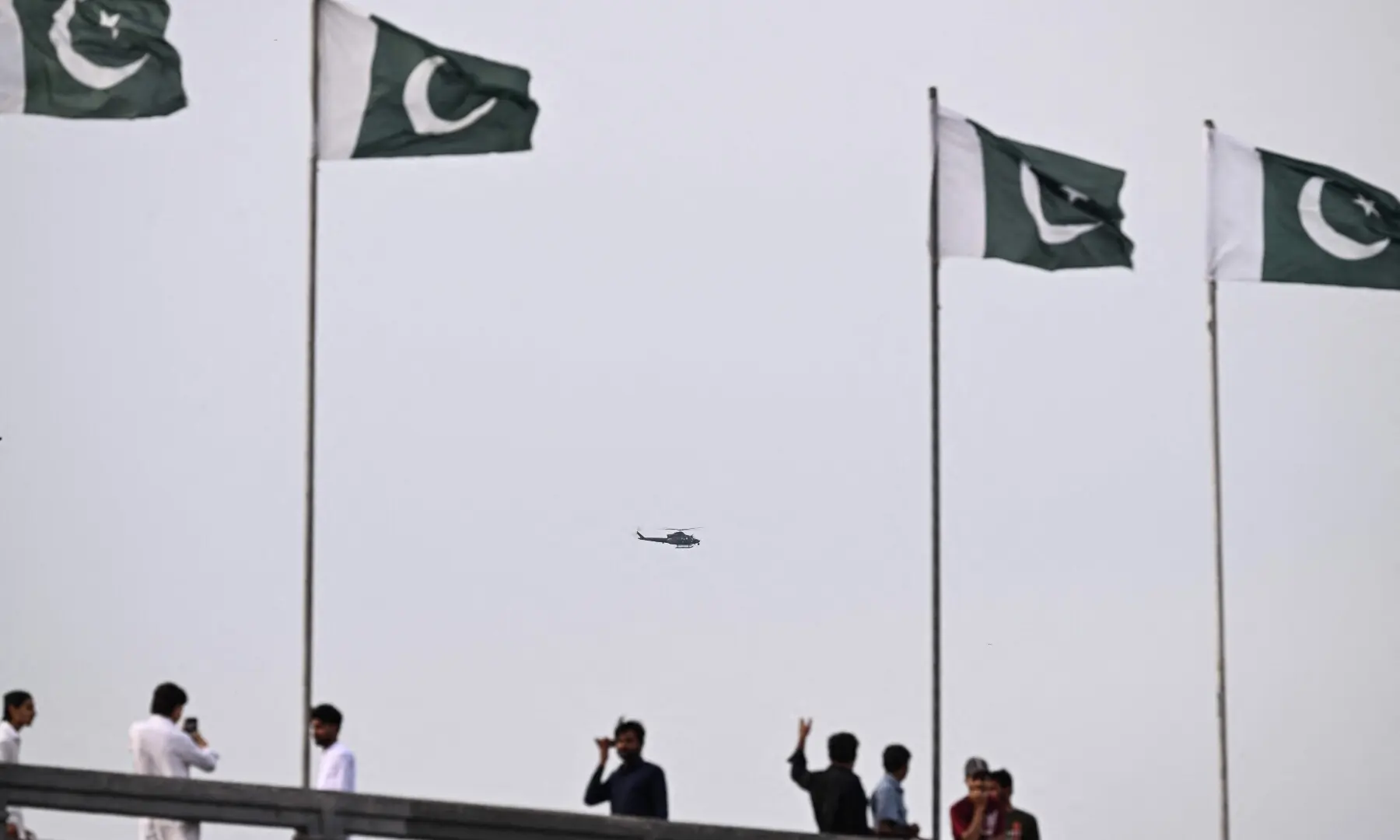 A helicopter flies over the Red Zone in Islamabad on April 10, 2026. A cloud of uncertainty hung April 10 over the scheduled start of talks in Pakistan between the United States and Iran, with no announcement yet on the arrival of negotiators and both sides accusing the other of failing to properly implement a fragile ceasefire. &mdash;AFP