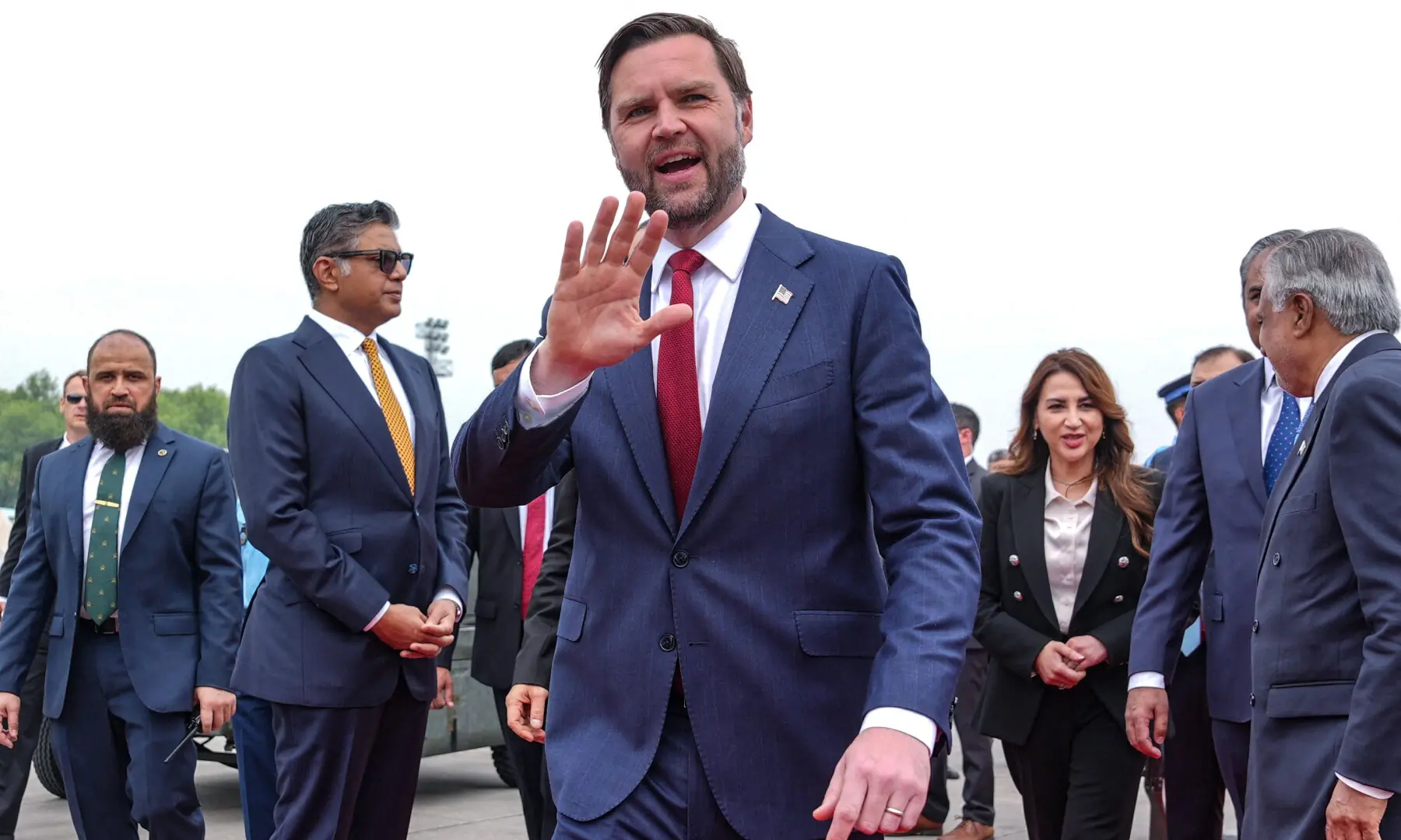 US Vice President JD Vance (C) gestures upon his arrival for the US-Iran peace talks in Islamabad on April 11, 2026. &mdash; AFP