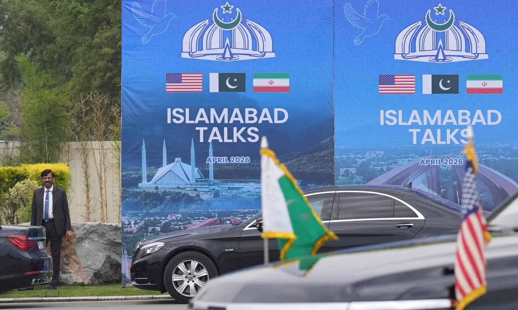 A Pakistani official stands during the arrival of the US Vice President JD Vance for talks with Iranian officials in Islamabad on April 11, 2026. — via Reuters