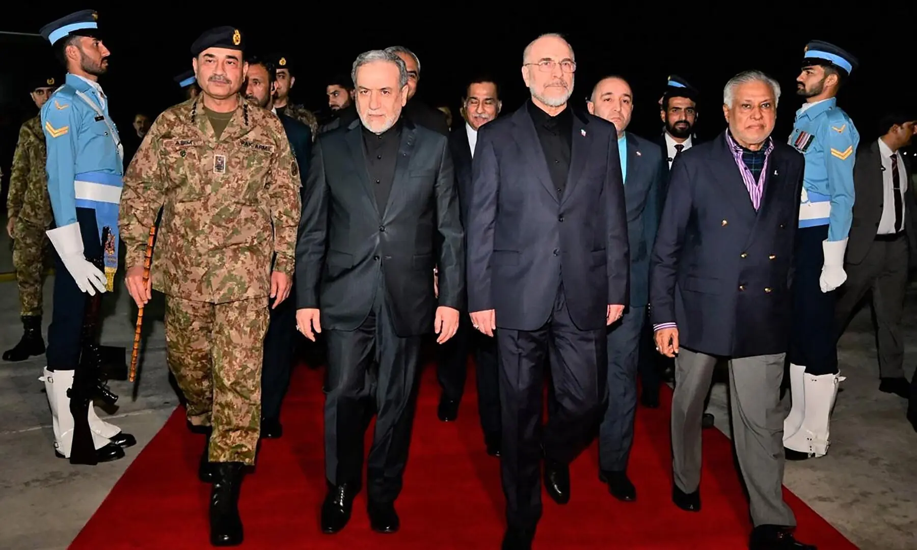 This handout photograph taken and released by Pakistan’s Ministry of Foreign Affairs on April 11, 2026 shows Pakistan’s Foreign Minister Ishaq Dar (2nd R) and Chief of Defence Forces (CDF) and Chief of Army Staff Field Marshal Asim (2nd L) walking with Iran’s Foreign Minister Abbas Araghchi (centre L) and Iran’s Parliament Speaker Mohammad Bagher Ghalibaf (centre R) upon their arrival at Nur Khan air base in Islamabad. —AFP