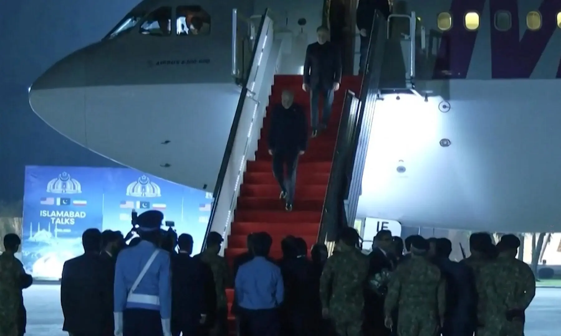 This screengrab of handout video released on April 11, 2026 by Pakistan’s Foreign Ministry shows the Iranian delegation walking down the stairs of their plane after arriving at Nur Khan Airbase in Islamabad. —AFP