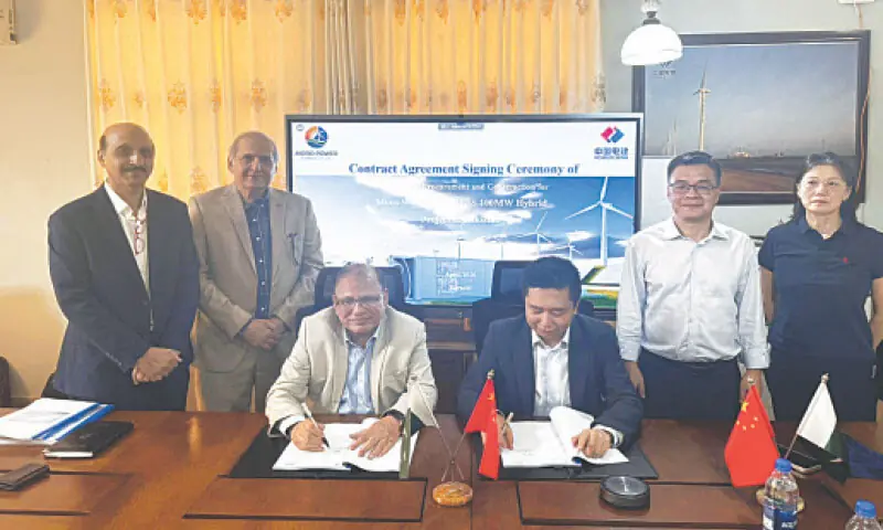Moro Power Company Chief Executive Officer Mustafa Abdullah and PowerChina Vice President Yang Jianduo sign a deal for 100MW renewable energy project combining wind, solar and storage tech.&mdash;Dawn