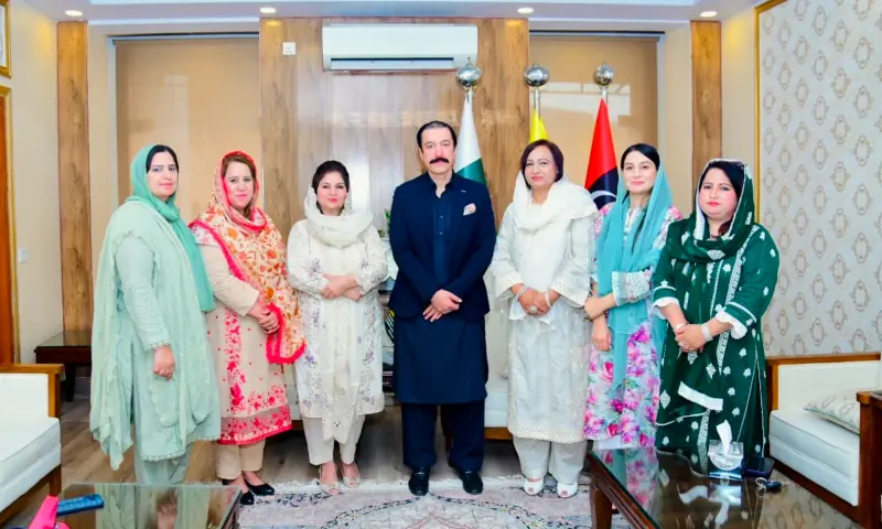 AJK Prime Minister Faisal Mumtaz Rathore poses for a photograph with a PPP Women&rsquo;s wing delegation, led by Shaheen Kousar Dar, in Kashmir House on Saturday. &mdash;  Photo via author